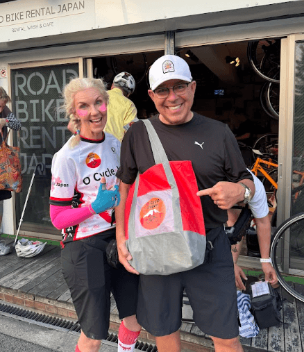 Cyclists back up their personal items as they finish a tour of over 320km through the Kansai region of Japan.