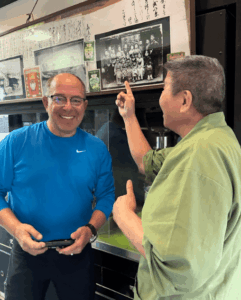 Family portrait showing shop owners father as a young child. He is a sixteenth generation green tea producer.