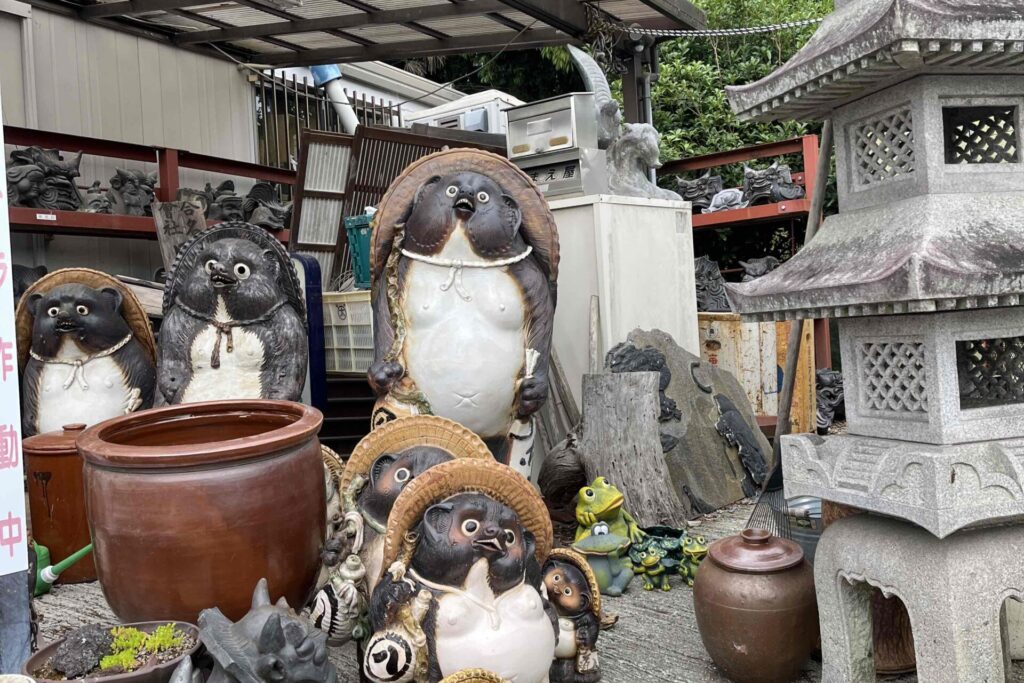 Tanuki a Japanese racoon dog mythical creature from folklore that brings good luck in Japanese culture.